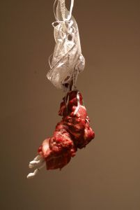 You Are Meat, pork butt, paper, joint tape, 2008.